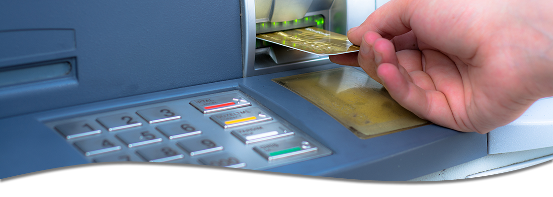 Close Up of Person Using ATM