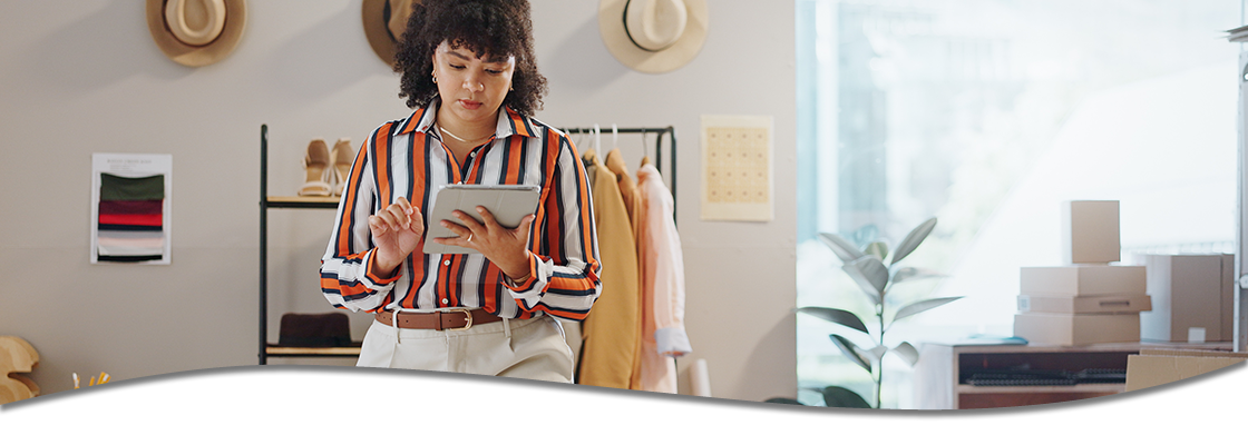 Woman on tablet in her business