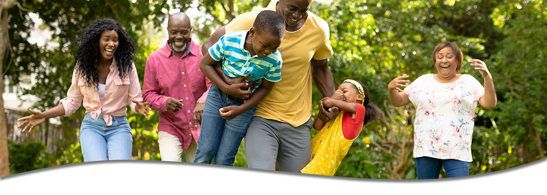 Family playing at a park together