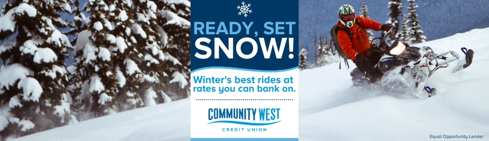 Ready, Set, SNOW! Winter's best rides at rates you can bank on. A person ridding a snowmobile through snow.